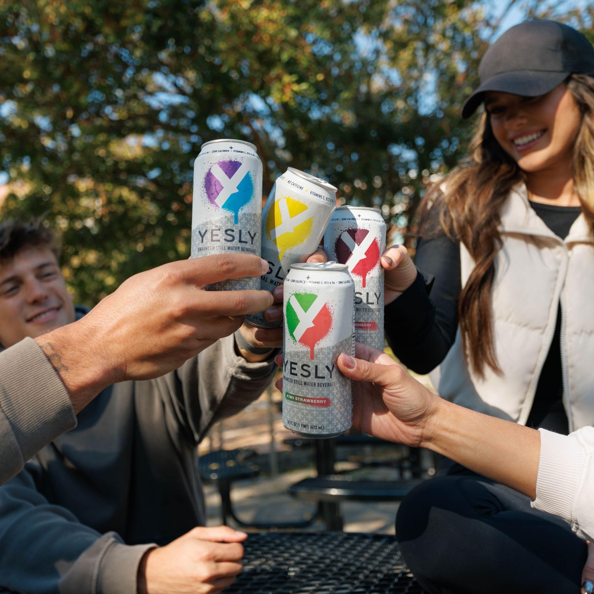 Yesly at picnic setting showing on-the-go hydration option