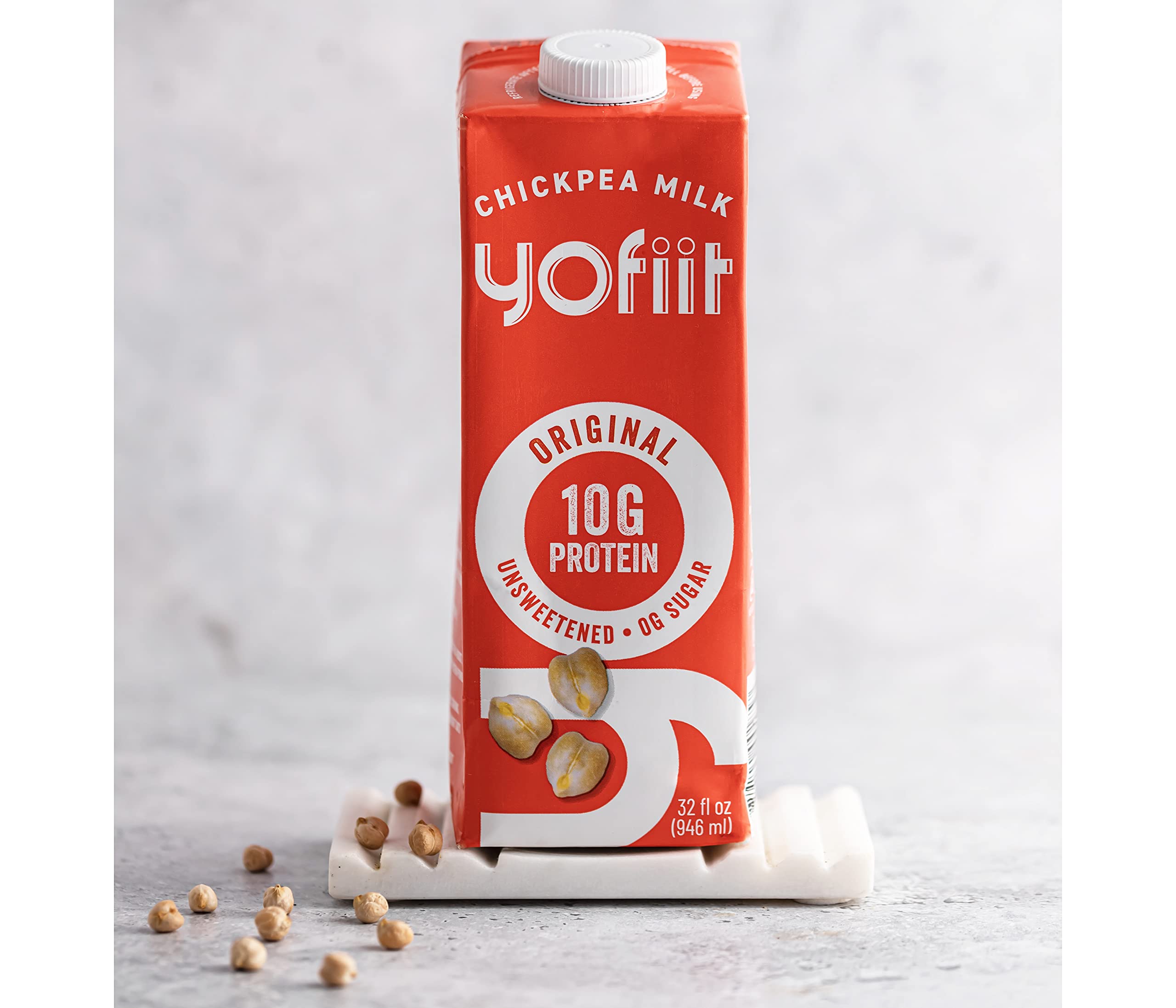 YoFiit on a breakfast table beside granola and fruit for healthy meal