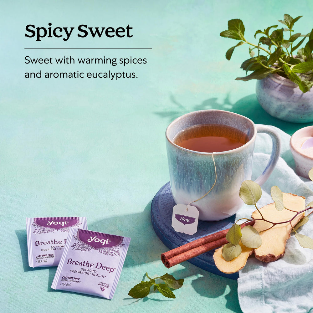 Steeping Yogi Breathe Deep tea in a cup capturing steam and aromatic release benefit