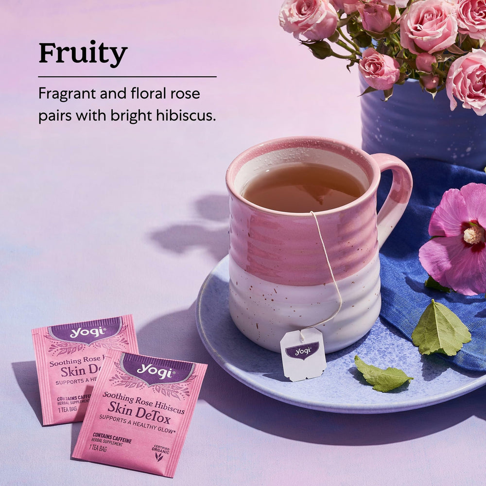 Yogi brewed cup in hand demonstrating comforting, skin-supportive ritual