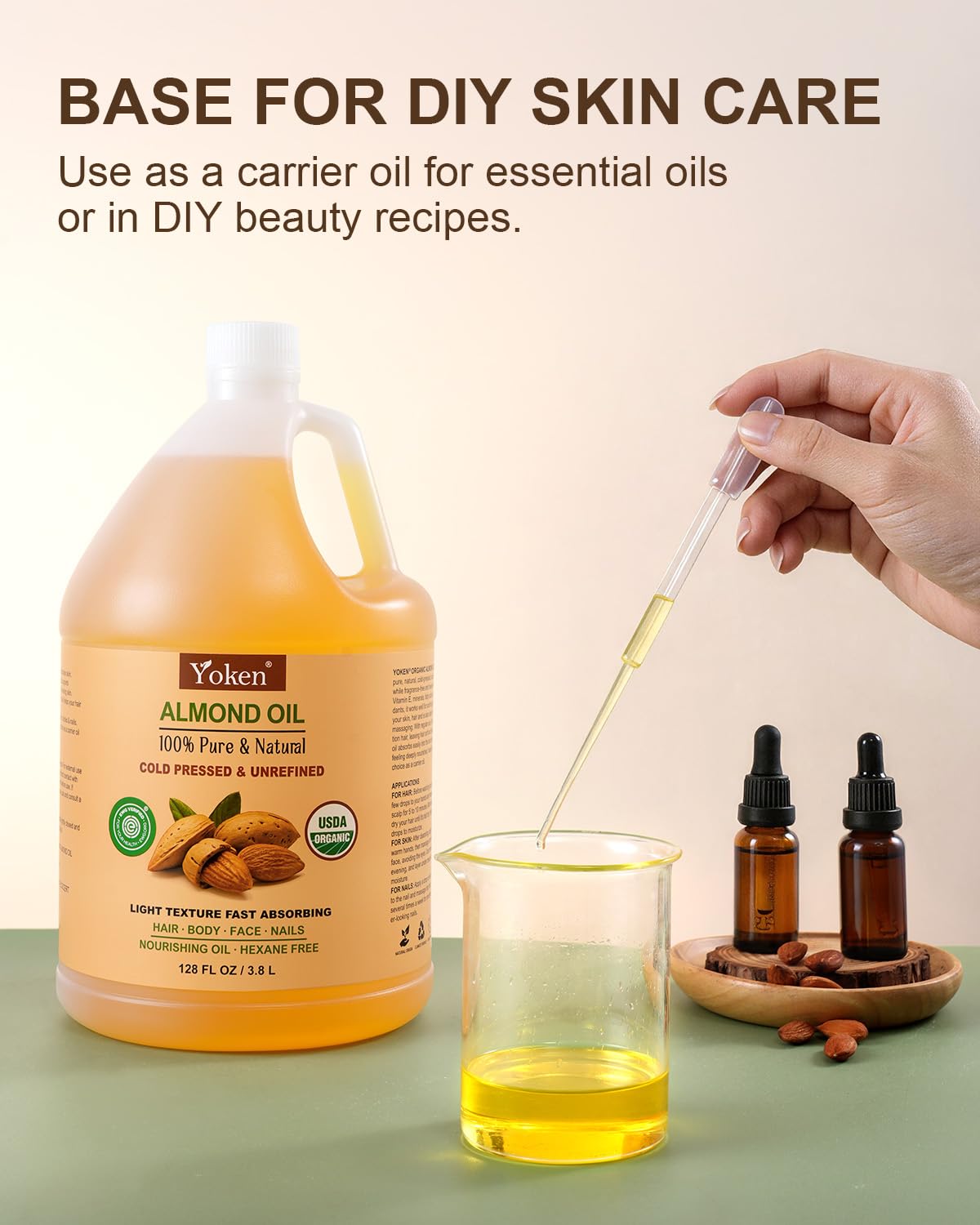 Yoken almond oil labeled seal detail showing organic cold-pressed certification benefit