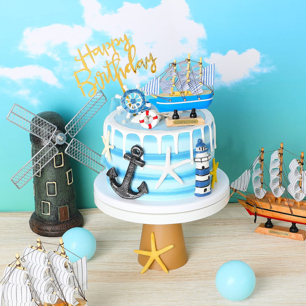 Yookeer boat topper placed on cake center, provides striking focal-point for parties