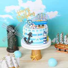 Yookeer boat topper placed on cake center, provides striking focal-point for parties