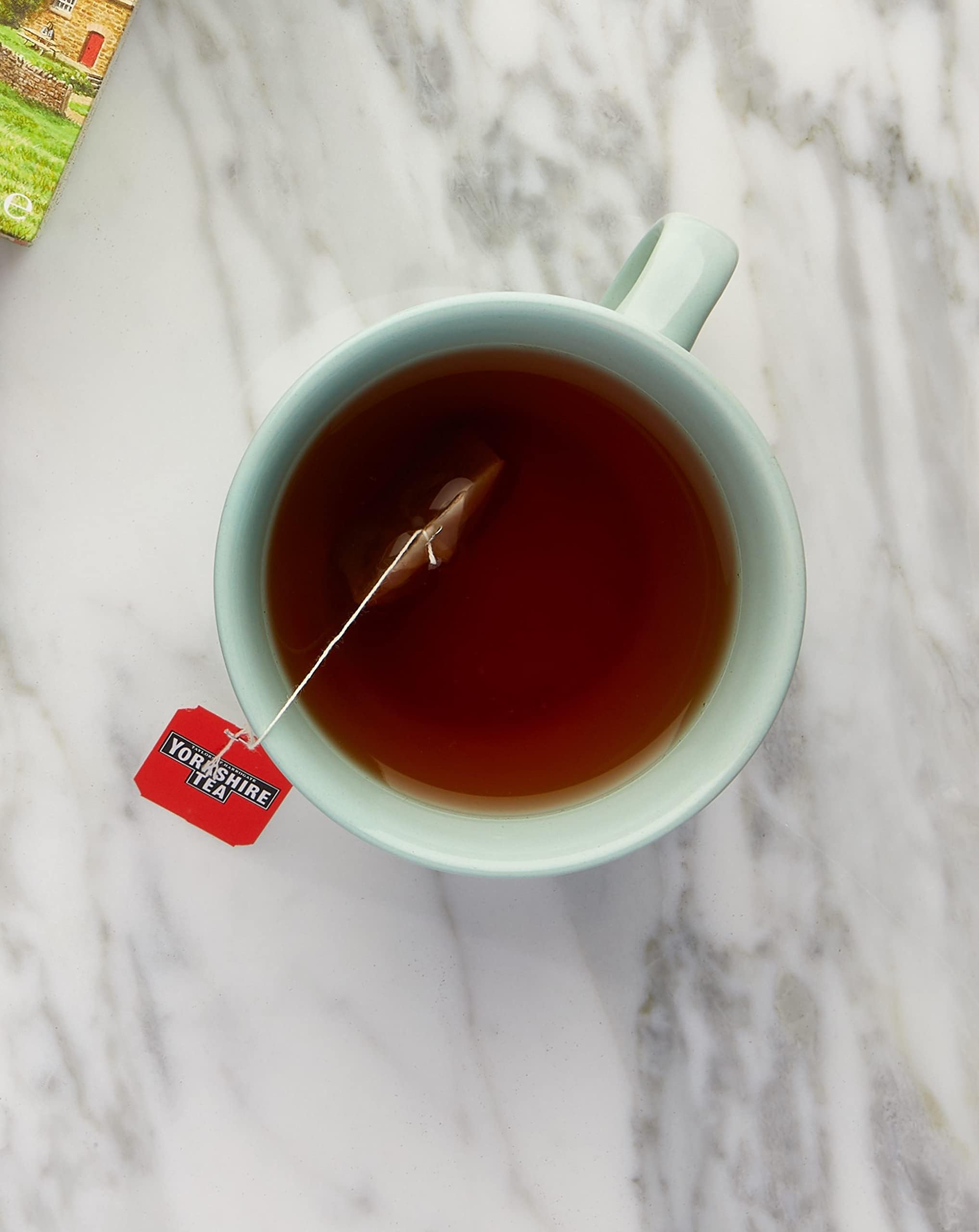 Yorkshire Tea tea bag steeping in cup showing infusion process for full-bodied taste