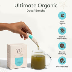 Yu single-serve stick packet held ready to open for portable brewing benefit