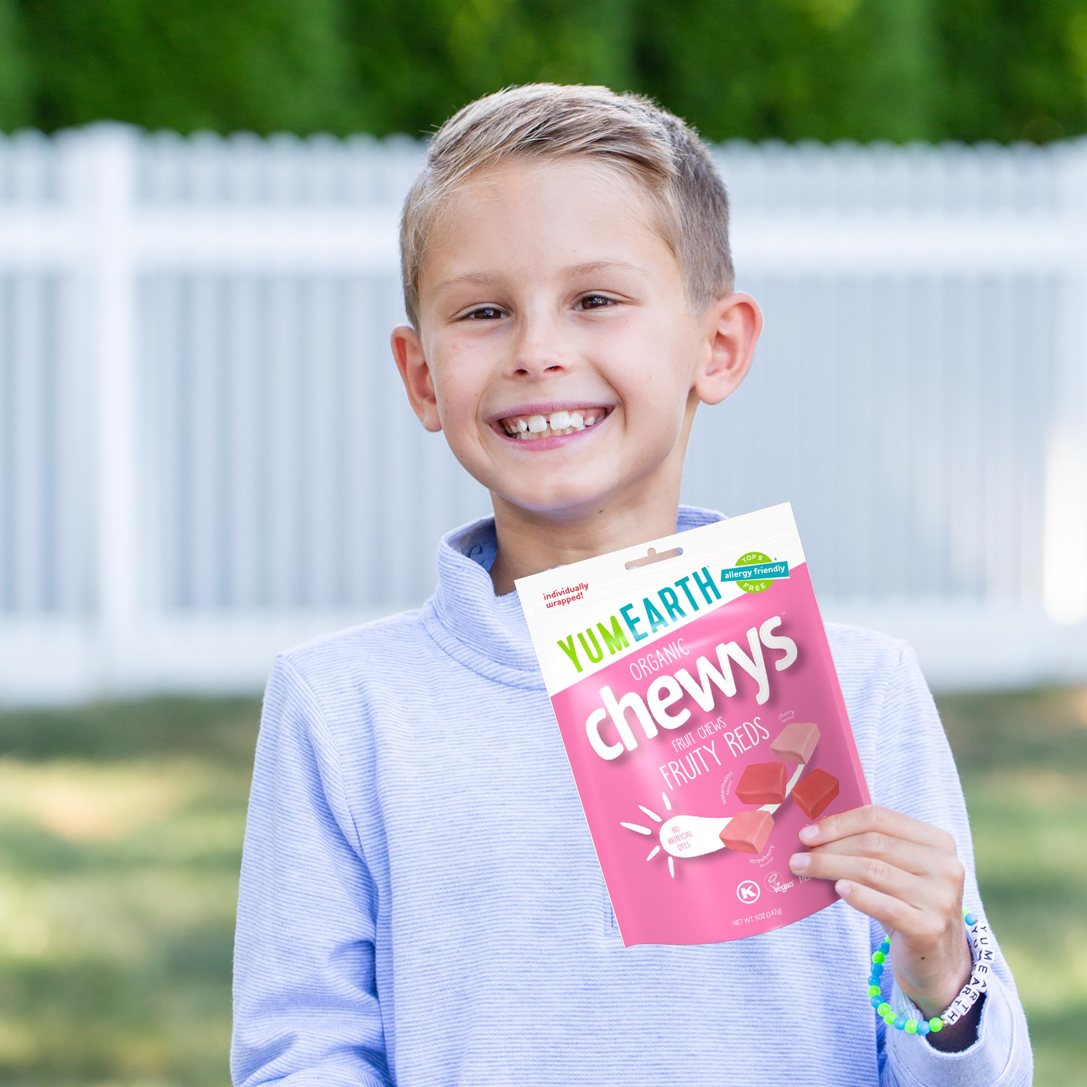 YumEarth candy being placed in a lunchbox for easy snacking