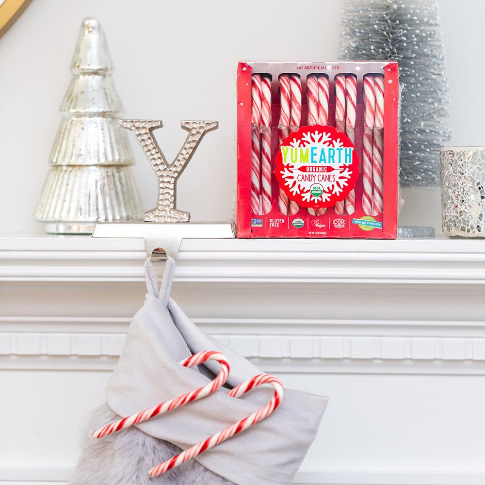 YumEarth canes hung on a tree offering festive non-toxic décor