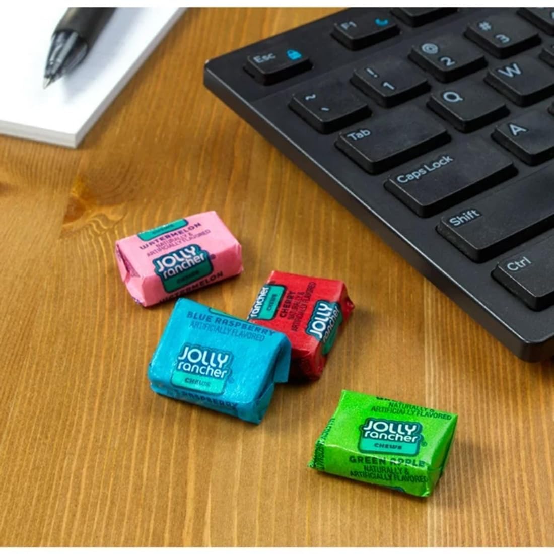 Yummy Chew JollyRancher pack beside a ruler showing scale and 95-piece quantity for value