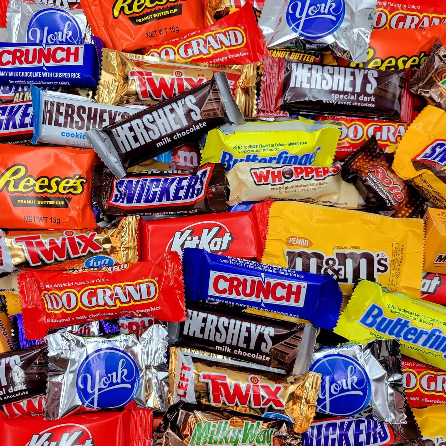Yummy Chew open box overhead view revealing assorted individually wrapped chocolates
