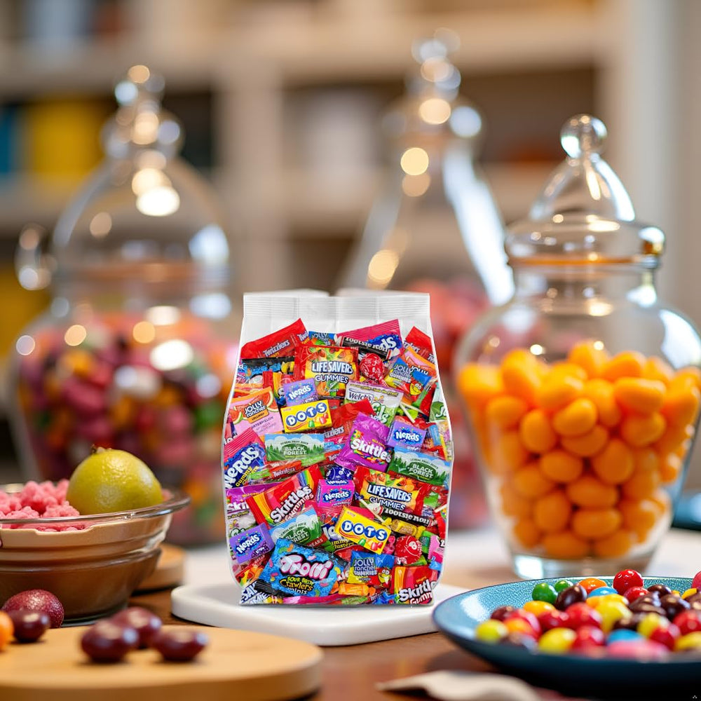 Yummy Chew party table display with candy bowls to enhance event décor