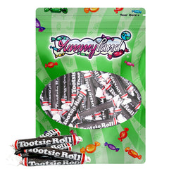 YUMMYLAND unwrapped roll held in hand to show size and easy portioning