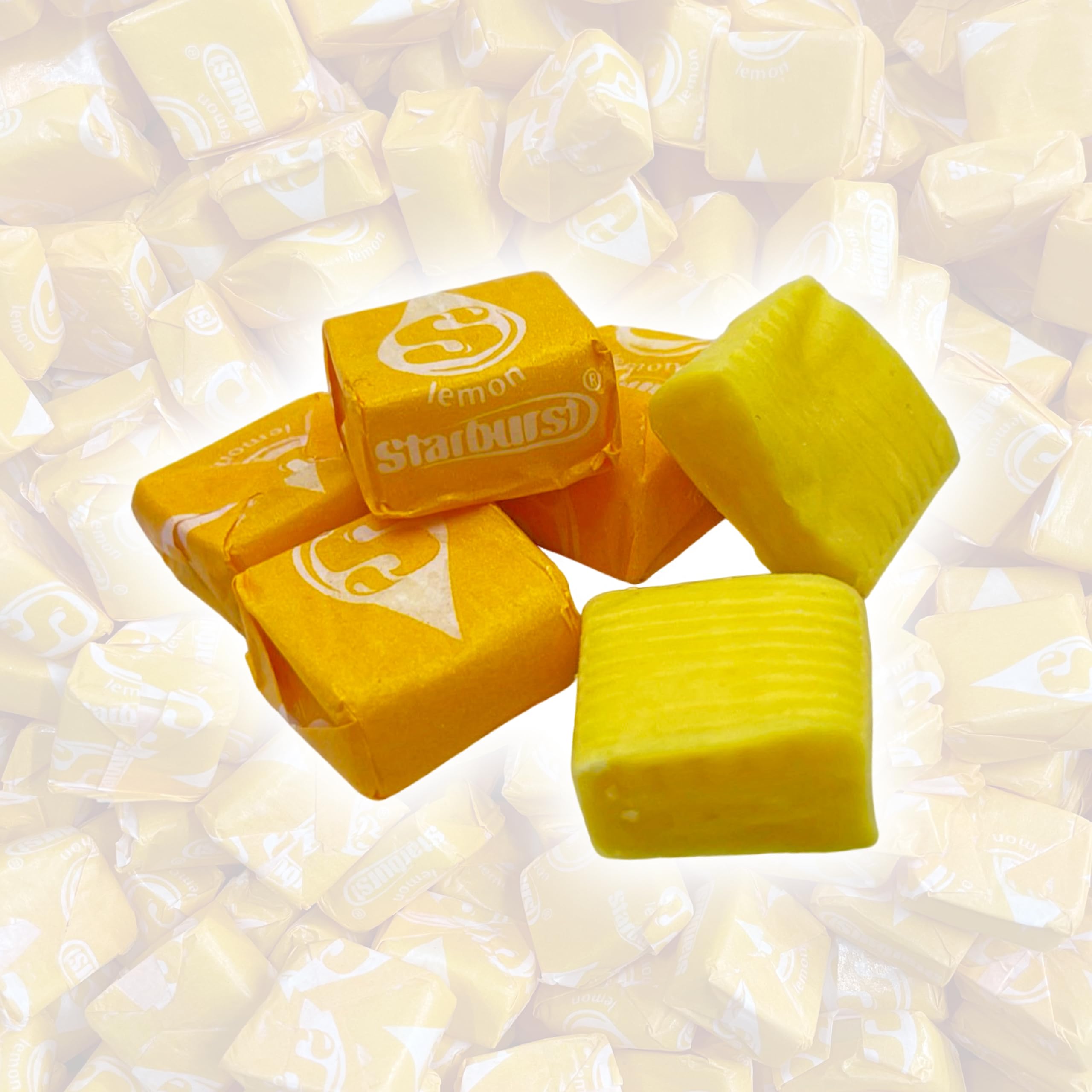 YUMMYLAND pile of individually wrapped lemon Star Bursts ready for sharing