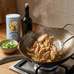 YUMYUM powder massaged on sliced meat highlighting tenderizing benefit before cooking