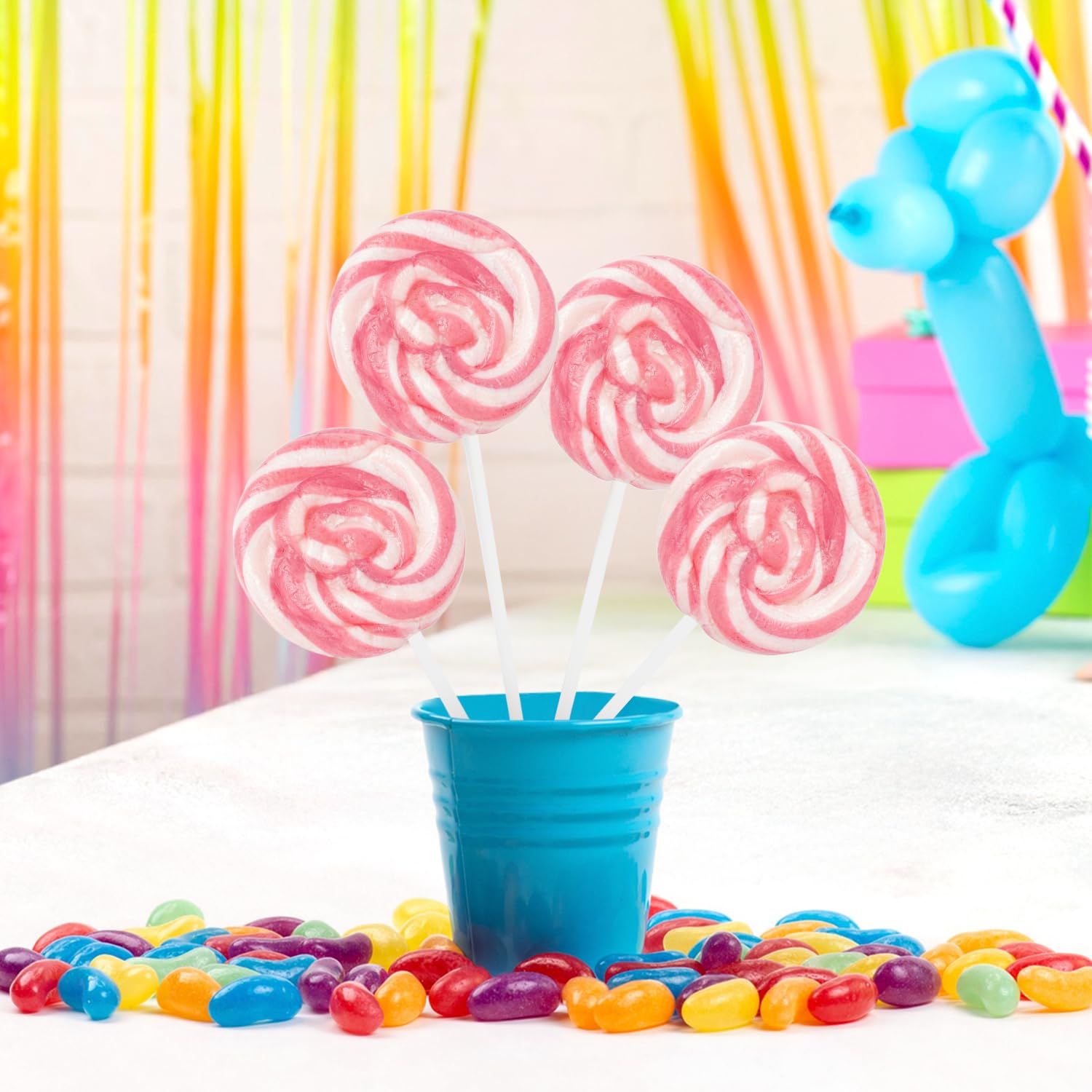 Yumzo lollipop held in hand showing size and long-lasting treat