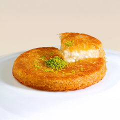 Yupik baked kanafeh with golden top showing crisp result and syrup pairing