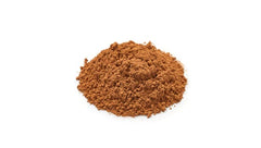 Yupik cocoa in mixing bowl with whisk showing baking-ready smoothness
