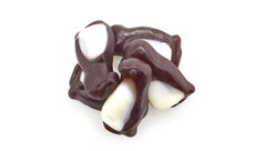 Yupik close-up of penguin gummy texture highlighting soft chew and real fruit juice