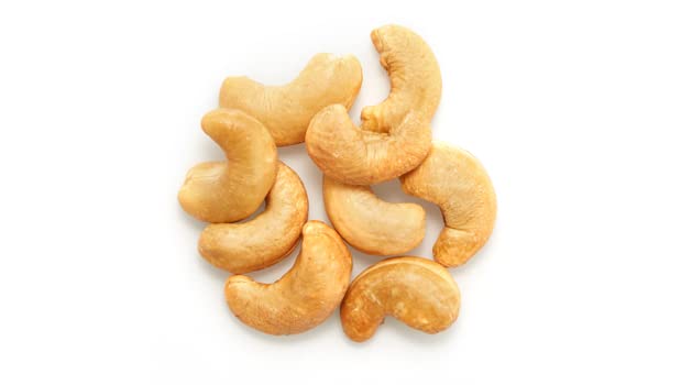Yupik close-up of dry roasted cashew texture highlighting crisp golden surface