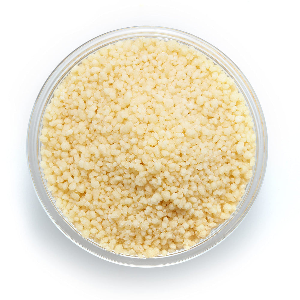 Close-up of Yupik couscous granules highlighting tender, nutty texture