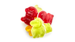Yupik bowl of jungle gummies on party table showing colorful sharing and decoration