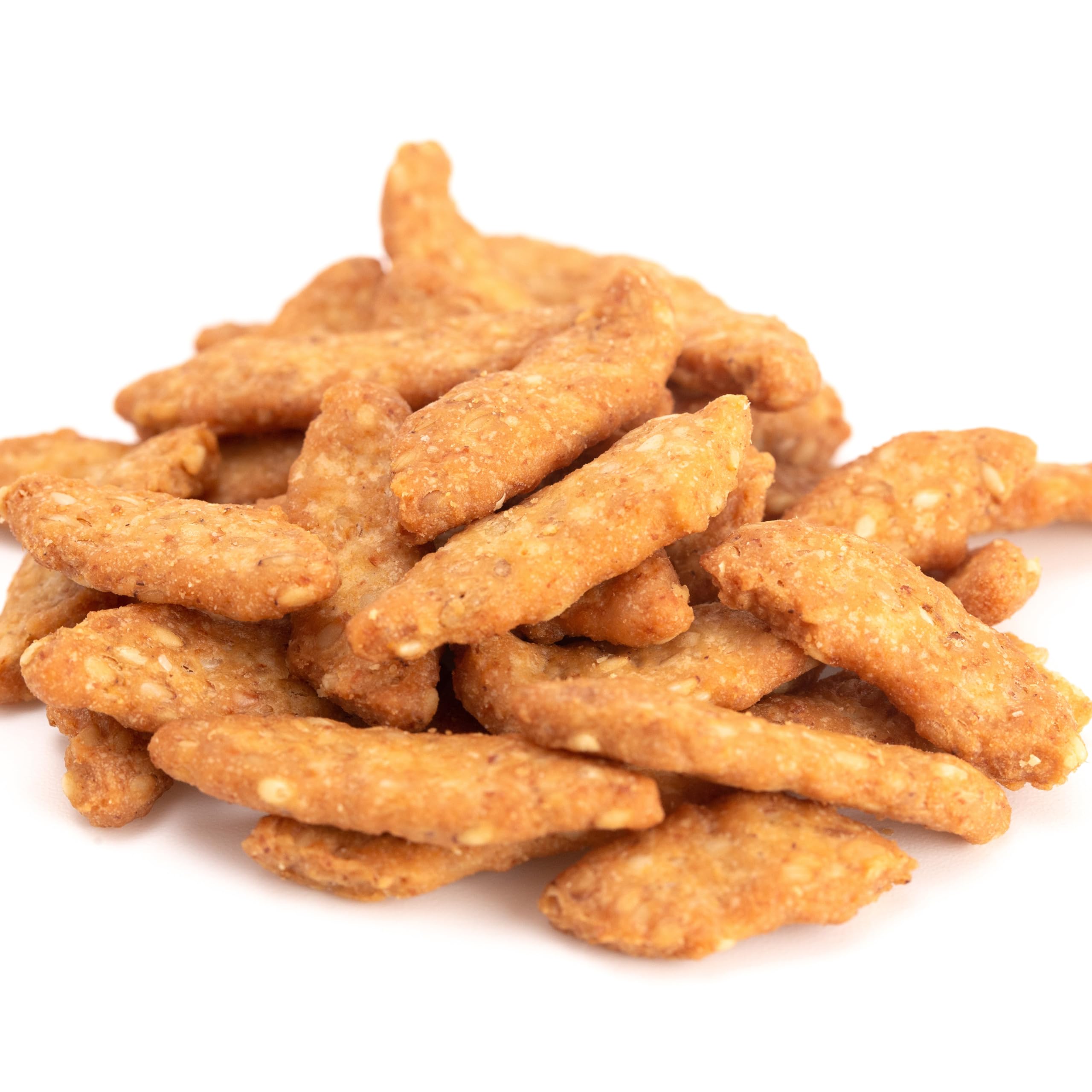 Yupik sesame sticks dipped in hummus showing dipping versatility