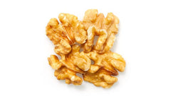 Yupik walnut close-up of halved texture highlighting firm buttery pieces