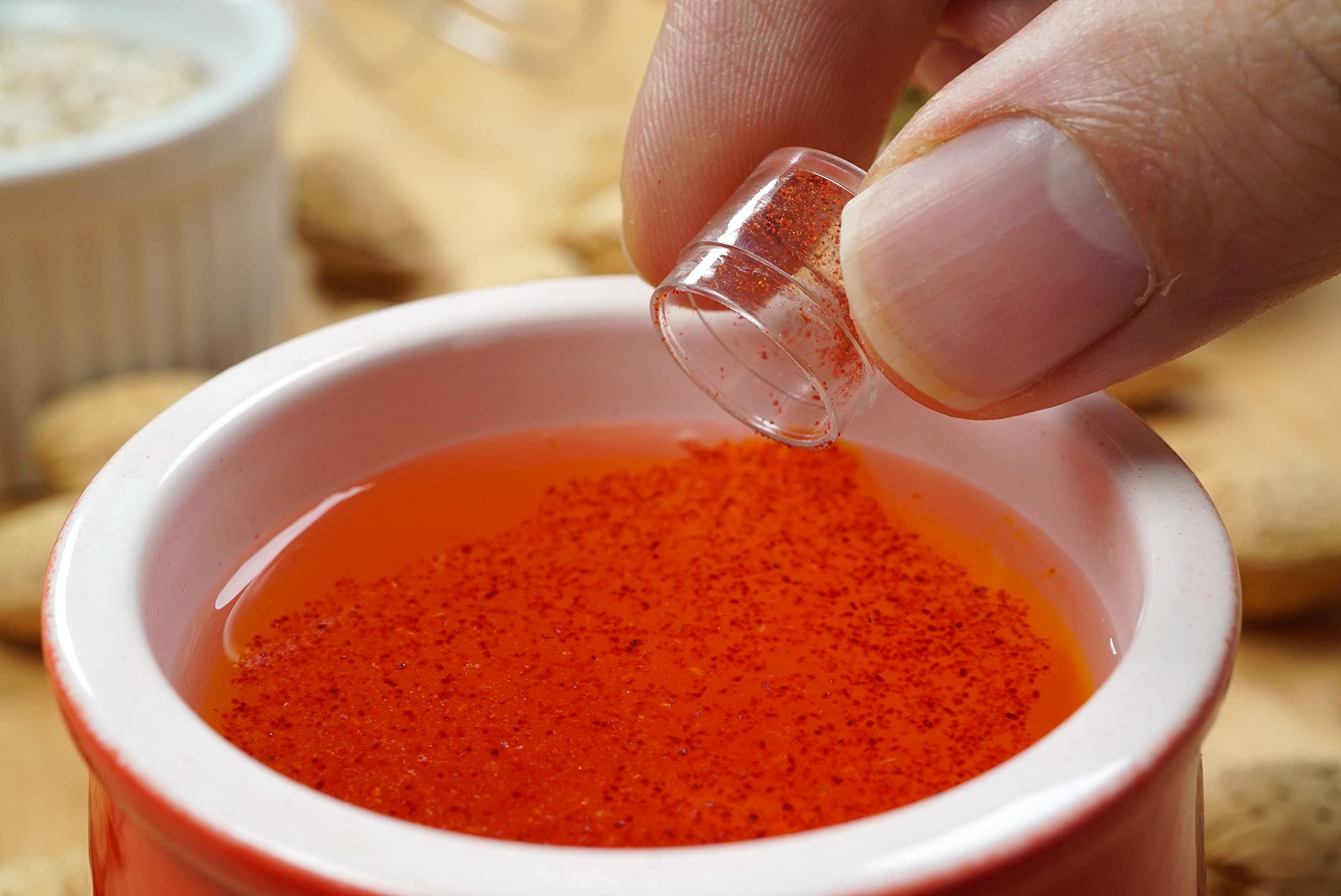 Zaffrus pod beside teaspoon to show size and convenient pre-measured portioning
