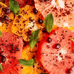 Z&Z ground sumac in wooden spoon ready to season food, adds bright citrus tang