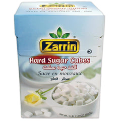 Zarrin sugar cube beside a teaspoon for scale and portioning benefit