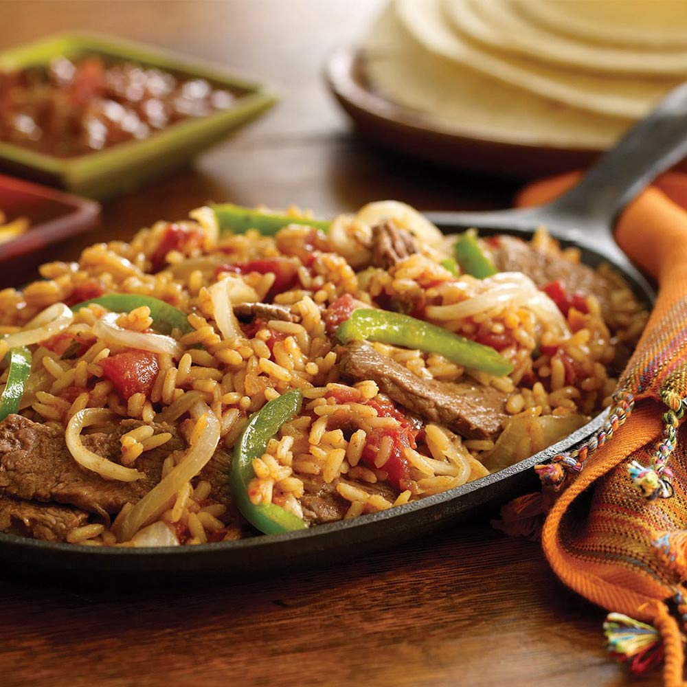 Bowl of Zatarain's rice mixed with colorful vegetables, boosting nutrition and color