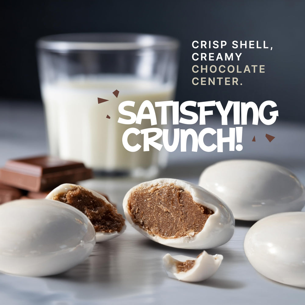 Zestix close-up of crisp white shell revealing milk chocolate center and texture benefit