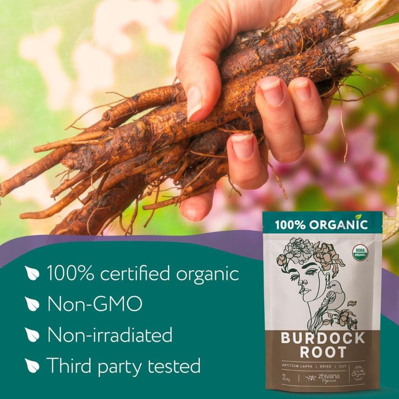 Cup of steeping burdock tea with Zhivana Organics roots showing warm, earthy infusion