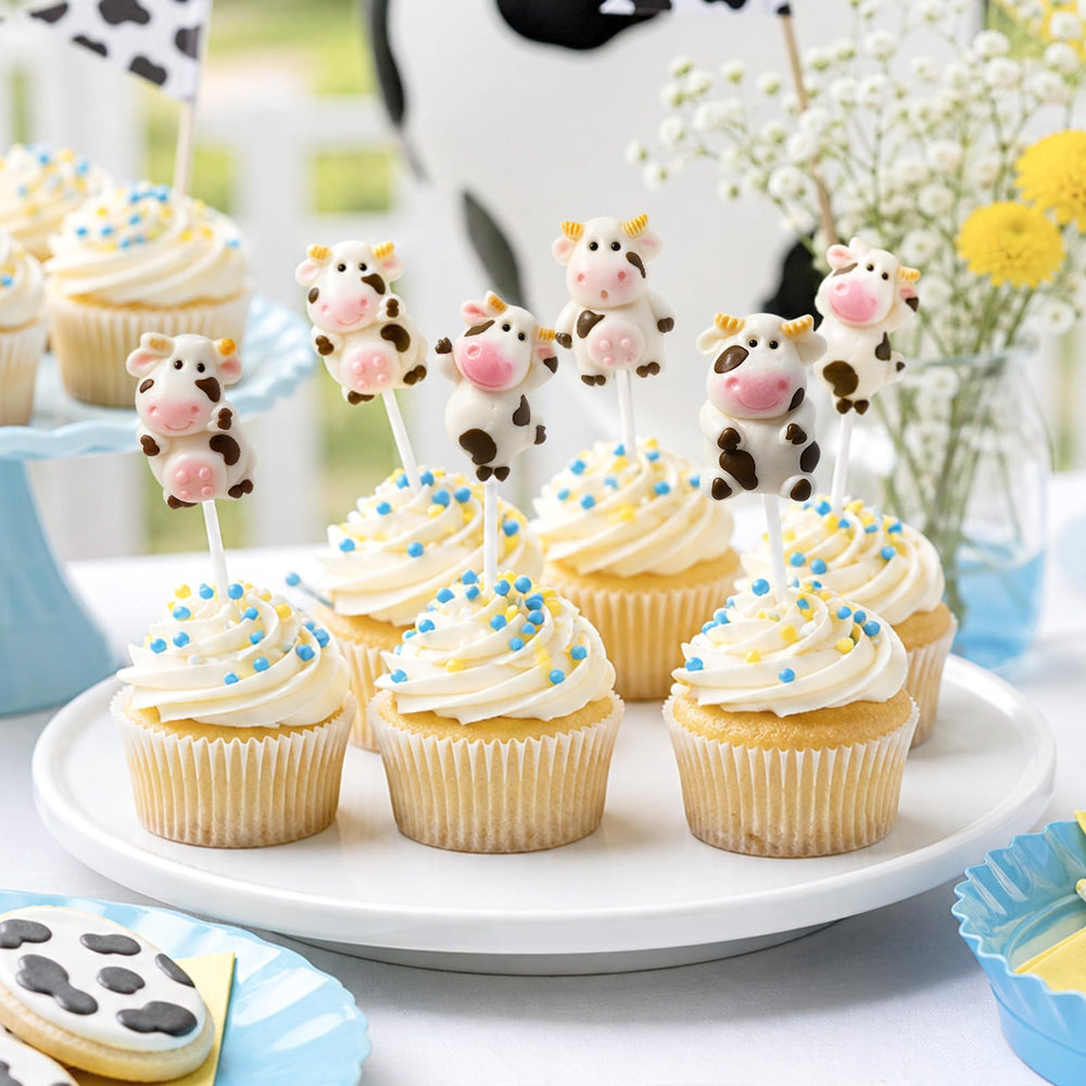 ZOFIA SWEET cow lollipop held in hand showing true size and kid-friendly portion