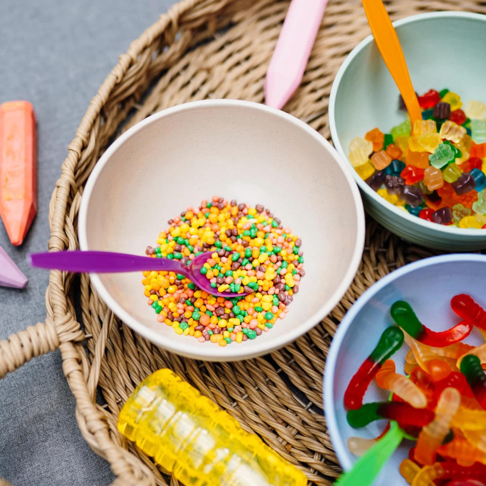 ZompoZ candy bowl at a party displaying rainbow mix for eye‑catching decor