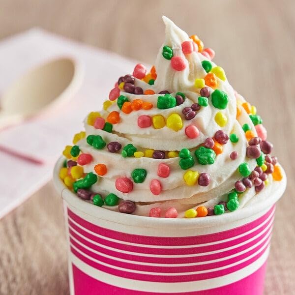 ZompoZ candies scattered on a cupcake demonstrating colorful dessert garnish