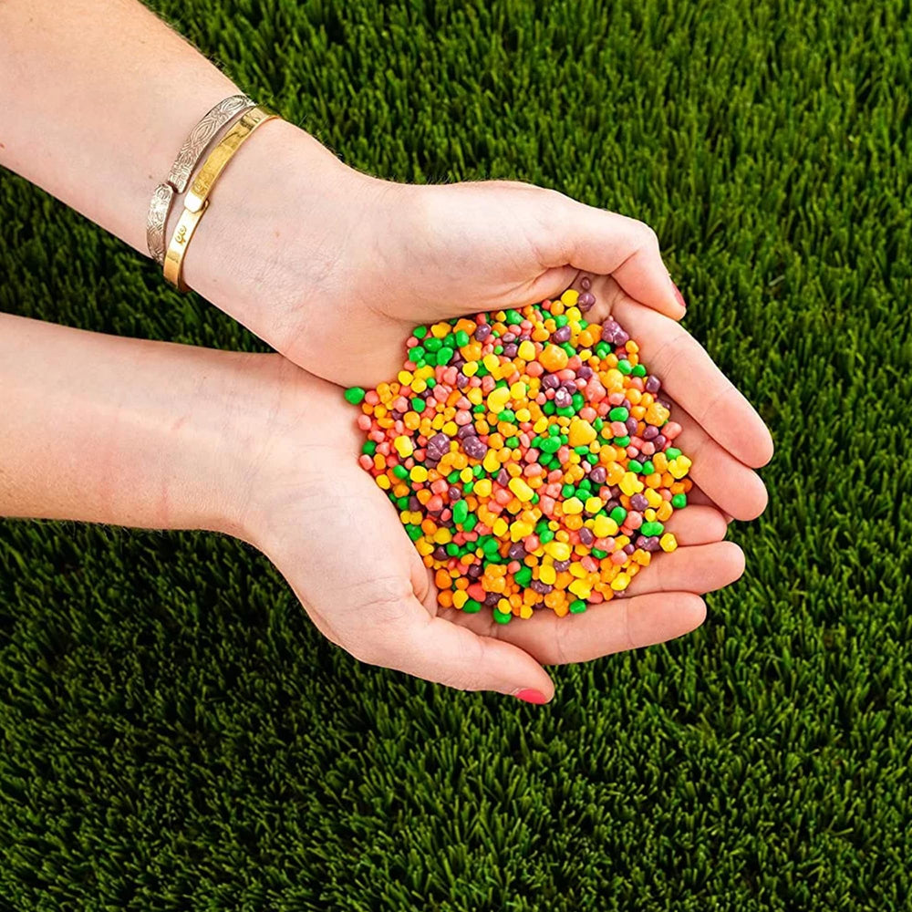 ZompoZ hand holding candies for scale to show bite‑size portion benefit