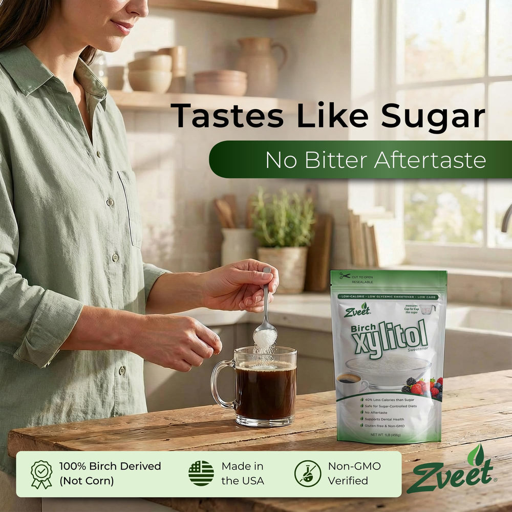 Zveet spoonful of xylitol powder close-up demonstrating sugar-like granules and scoopability